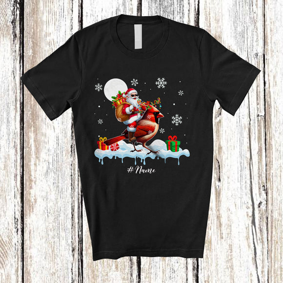 MacnyStore - Personalized Custom Name Santa Riding Cardinal; Awesome Christmas Snowing Bird; Family T-Shirt