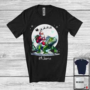 MacnyStore - Personalized Custom Name Santa Riding Iguana, Merry Christmas Moon Snow Iguana, X-mas Team T-Shirt