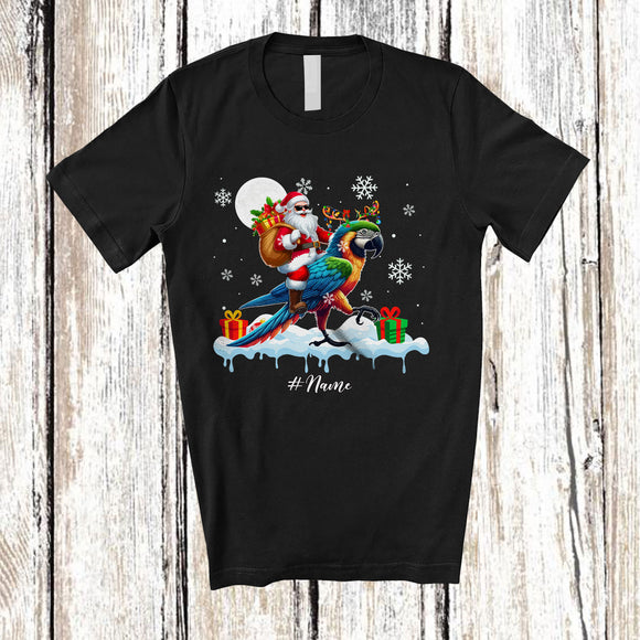 MacnyStore - Personalized Custom Name Santa Riding Macaw; Awesome Christmas Snowing Bird; Family T-Shirt