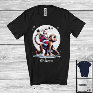 MacnyStore - Personalized Custom Name Santa Riding Monkey, Merry Christmas Moon Snow Monkey, X-mas T-Shirt
