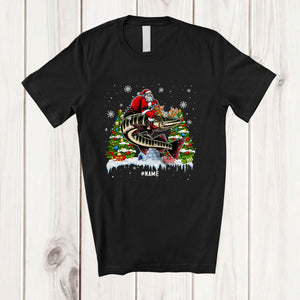 MacnyStore - Personalized Custom Name Santa Riding Muskellunge Reindeer; Humorous Christmas Lights Sea Animal T-Shirt