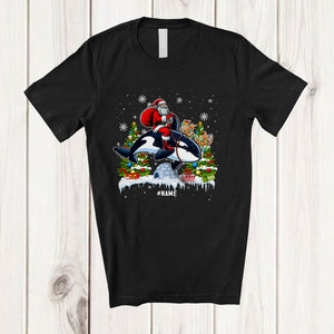 MacnyStore - Personalized Custom Name Santa Riding Orca Reindeer; Humorous Christmas Lights Sea Animal T-Shirt