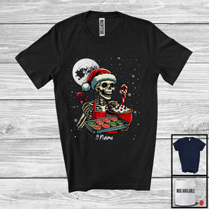 MacnyStore - Personalized Custom Name Santa Skeleton Baking; Awesome Christmas Skeleton; Moon Snowing T-Shirt