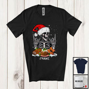 MacnyStore - Personalized Custom Name Santa Skeleton With X-mas Dinner; Amazing Christmas Snowing; Family T-Shirt