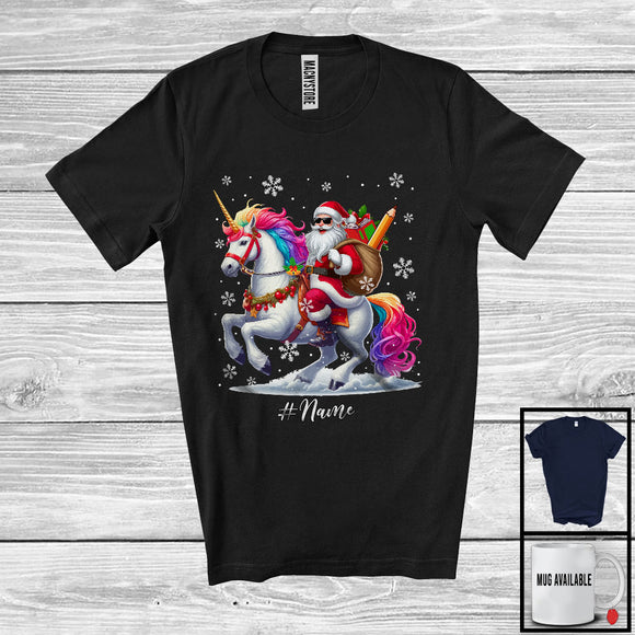 MacnyStore - Personalized Custom Name Santa Teacher Riding Unicorn; Proud Christmas Snow; Jobs Careers T-Shirt