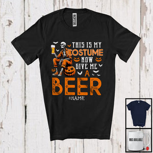 MacnyStore - Personalized Custom Name This Is My Costume Give Me A Beer; Horror Halloween Skeleton; Drinking T-Shirt