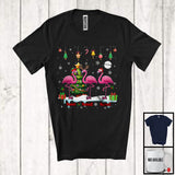 MacnyStore - Personalized Custom Name Three Elf Santa Flamingo Snowing; Joyful Christmas Tree Animal T-Shirt