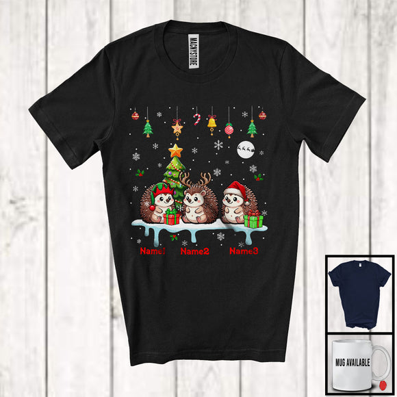 MacnyStore - Personalized Custom Name Three Elf Santa Hedgehog Snowing; Joyful Christmas Tree Animal T-Shirt