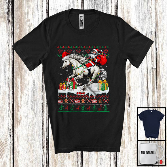 MacnyStore - Personalized Custom Name Santa Riding Horse; Lovely Christmas Lights Sweater Santa Horse Lover T-Shirt