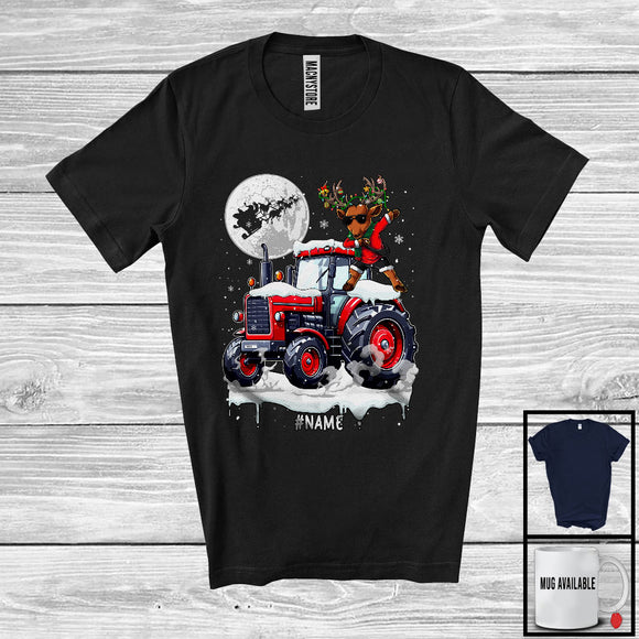 MacnyStore - Personalized Dabbing Reindeer On Tractor; Joyful Christmas Custom Name; Tractor Driver T-Shirt