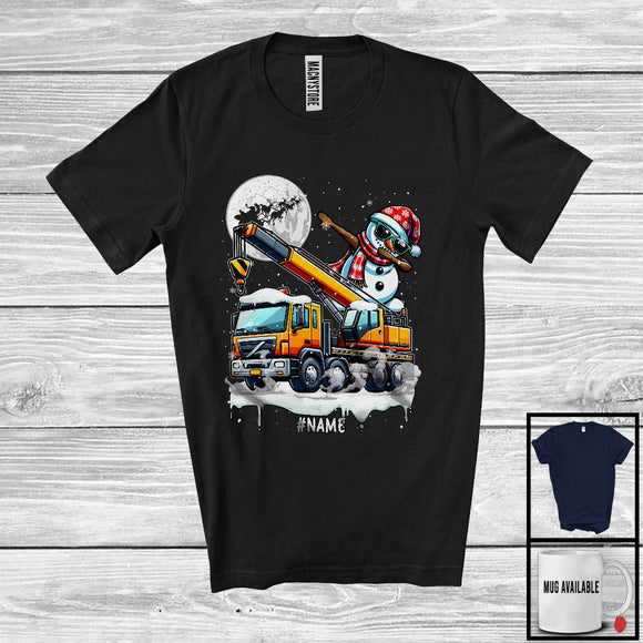 MacnyStore - Personalized Dabbing Snowman On Crane Truck; Joyful Christmas Custom Name; Crane Truck Driver T-Shirt