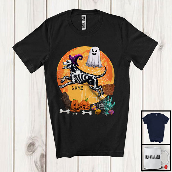MacnyStore - Personalized Dog Skeleton Witch On Broomstick, Scary Halloween Moon, Custom Name Boo Ghost T-Shirt