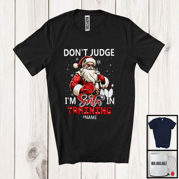 MacnyStore - Personalized Don't Judge Santa In Training; Humorous Christmas Custom Name Bowling Santa T-Shirt