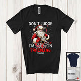 MacnyStore - Personalized Don't Judge Santa In Training; Humorous Christmas Custom Name Ice Hockey Santa T-Shirt