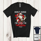 MacnyStore - Personalized Don't Judge Santa In Training; Humorous Christmas Custom Name Trucker Santa T-Shirt