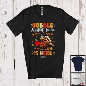 MacnyStore - Personalized Gobble Assistant Teacher Is Here; Humorous Thanksgiving Turkey; Custom Name Jobs T-Shirt