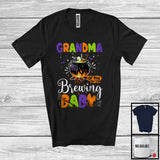 MacnyStore - Personalized Grandma Of The Brewing Baby, Humorous Halloween Pregnancy Custom Name, Witch Family T-Shirt