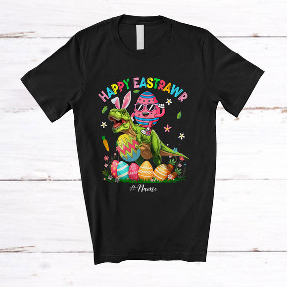 MacnyStore - Personalized Happy Eastrawr; Joyful Easter Egg Riding T-Rex; Custom Name Dinosaur Family T-Shirt