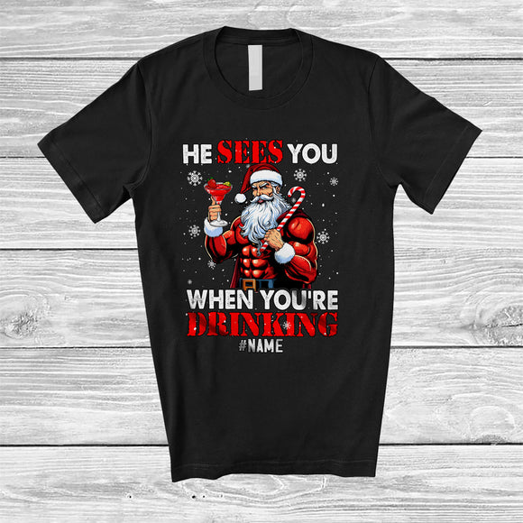 MacnyStore - Personalized He Sees When You're Drinking; Merry Christmas Santa Cocktail; Snowing Drunker T-Shirt