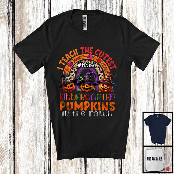 MacnyStore - Personalized I Teach The Cutest Kindergarten Pumpkins; Scary Halloween Custom Name Teacher; Rainbow T-Shirt