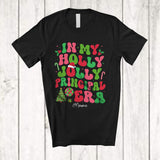 MacnyStore - Personalized In My Holly Jolly Principal Era; Amazing Christmas Groovy Santa; Custom Name Jobs T-Shirt