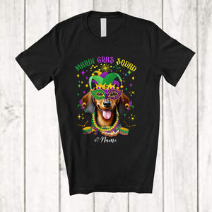 MacnyStore - Personalized Mardi Gras Squad; Adorable Custom Name Dachshund Face; Masked Jester Hat T-Shirt