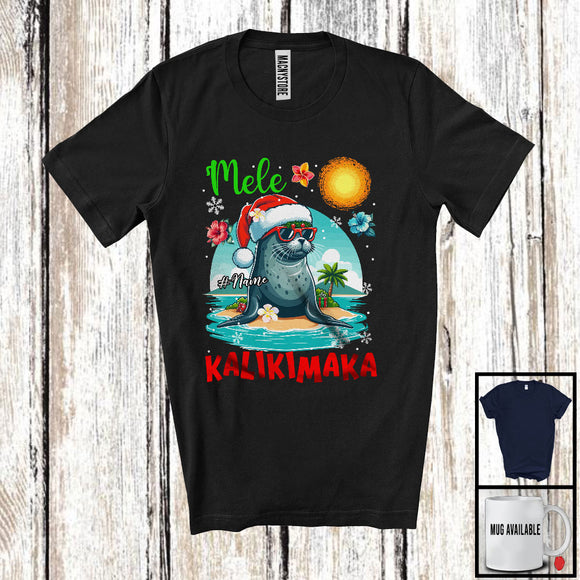 MacnyStore - Personalized Mele Kalikimaka; Joyful Christmas Custom Name Hawaiian Santa Monk Seal T-Shirt