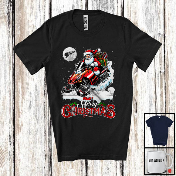 MacnyStore - Personalized Merry Christmas; Humorous X-mas Santa Riding Snowmobile Snowing; Custom Name Family T-Shirt