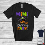 MacnyStore - Personalized Mimi Of The Brewing Baby, Humorous Halloween Pregnancy Custom Name, Witch Family T-Shirt