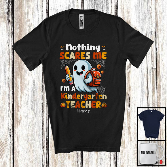 MacnyStore - Personalized Nothing Scares Me I'm A Kindergarten Teacher; Lovely Halloween Custom Name Boo Ghost T-Shirt