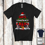 MacnyStore - Personalized Santa Is Promoting Me To Dad; Merry Christmas Santa Tree; Custom Name Family T-Shirt