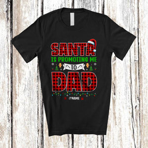 MacnyStore - Personalized Santa Promoting Me to Dad; Amusing Christmas Pregnancy; Plaid Custom Name Family T-Shirt