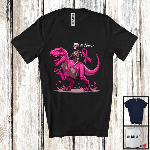 MacnyStore - Personalized Skeleton Riding T-Rex; Scary Halloween Breast Cancer Awareness Ribbon; Custom Name T-Shirt