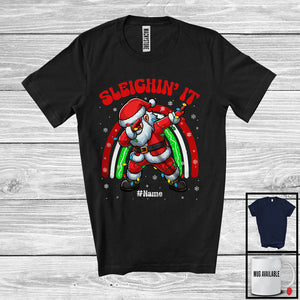 MacnyStore - Personalized Sleighin' It; Sarcastic Christmas Lights Dabbing Santa Rainbow; Custom Name Family T-Shirt