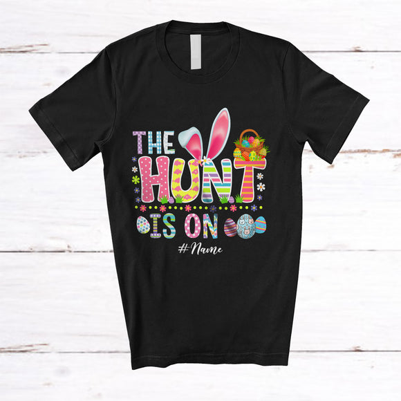 MacnyStore - Personalized The Hunt Is On; Awesome Easter Custom Name Bunny Eggs Hunting; Flowers Family T-Shirt