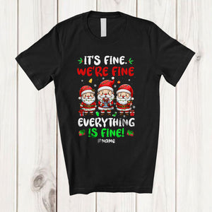 MacnyStore - Personalized We're Fine Everything; Lovely Christmas Three Santa; Custom Name Teacher T-Shirt