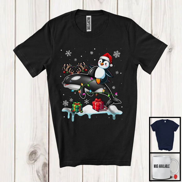 MacnyStore - Santa Penguin Riding Reindeer Orca; Adorable Christmas Lights Animal Lover; Snowing T-Shirt