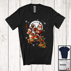 MacnyStore - Santa Playing Violin Riding Reindeer; Awesome Christmas Lights Violin Player; Musical Instruments T-Shirt