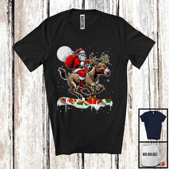 MacnyStore - Santa Riding Donkey Reindeer; Amusing Christmas Lights Santa Donkey Animal; Snowing T-Shirt