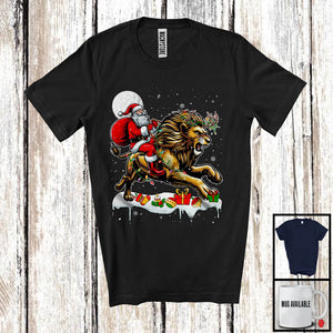 MacnyStore - Santa Riding Lion Reindeer; Amusing Christmas Lights Santa Lion Animal; Snowing T-Shirt