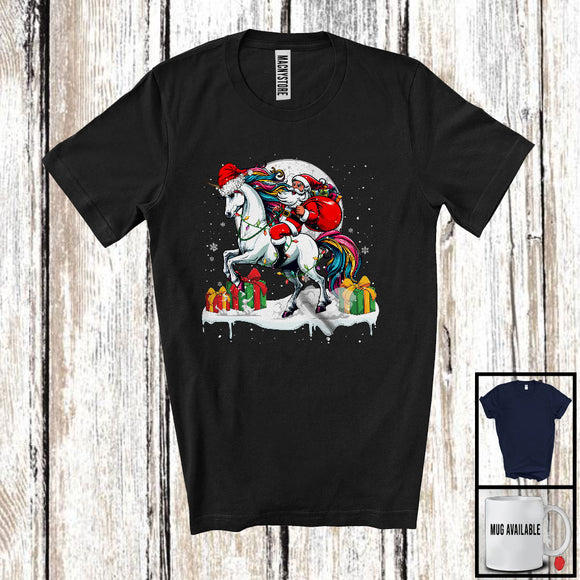 MacnyStore - Santa Riding Unicorn; Adorable Christmas Lights Moon Santa Unicorn; X-mas Animal Lover T-Shirt