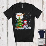 MacnyStore - Snowman Playing Golf Team; Cheerful Christmas Tree Lights Snowing; X-mas Sport Player T-Shirt