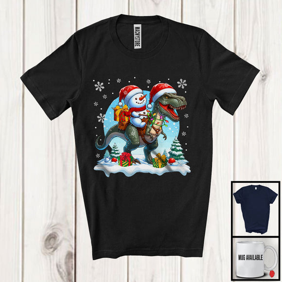 MacnyStore - Snowman Riding T-Rex; Awesome Christmas Lights Snowing Lover; X-mas Family Group T-Shirt