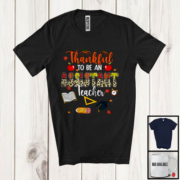 MacnyStore - Thankful To Be An Assistant Teacher; Proud Thanksgiving Leopard Plaid Assistant Teacher; Fall Leaves Family T-Shirt