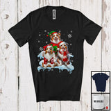 MacnyStore - Three Santa Elf Australian Shepherds On Snow; Adorable Christmas Snowing Dog; Family Group T-Shirt