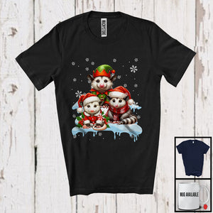 MacnyStore - Three Santa Elf Opossums On Snow; Adorable Christmas Snowing Opossum Lover; Family Group T-Shirt