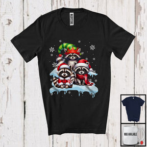 MacnyStore - Three Santa Elf Raccoons On Snow; Adorable Christmas Snowing Raccoon Lover; Family Group T-Shirt