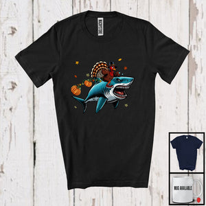 MacnyStore - Turkey Riding Shark; Humorous Thanksgiving Autumn Leaves Animal; Pumpkin Family Group T-Shirt