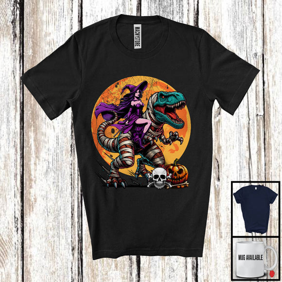 MacnyStore - Witch Riding T-Rex Mummy, Humorous Halloween Dinosaur Pumpkin, Trick Or Treat Candy T-Shirt