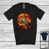 MacnyStore - Witch Skeleton Riding T-Rex, Scary Halloween Costume Moon Carved Pumpkins, Dinosaur Lover T-Shirt